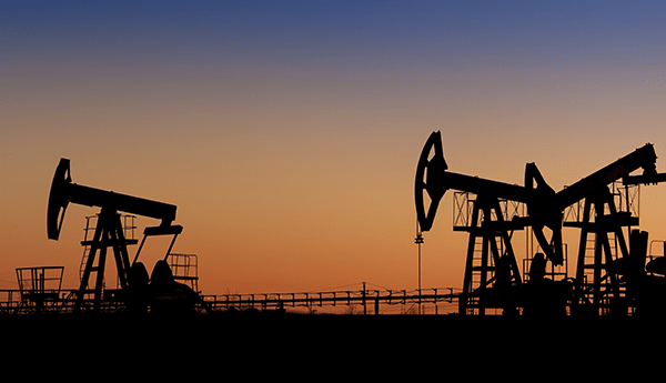 Extracting crude oil with pump on oil field